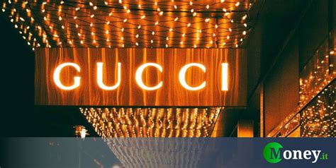 gucci acquisizione